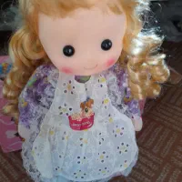 عروسک و ماشین بازی