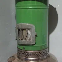 تلفن و چراغ نفتی