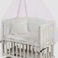 گهواره کنار مادر