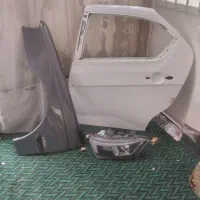 درعقب چپ دنا پلاس بدون رنگ گلگیرجلوی پژو چپ بی رنگ