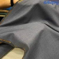 تعدادی پارچه پیراهنی و شلواری