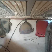 یک‌دستگاه‌خرمن‌کوب‌وتریلی‌وتانک‌