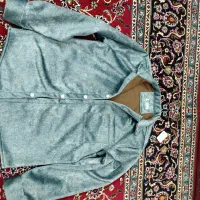 کاپشن، کتونی، بامبر، پیراهن پشمی|کیف، کفش، کمربند|کبودرآهنگ, |دیوار