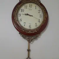 ساعت دیواری طرح چوب