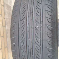 یک عدد لاستیک یزد 205/60R14، کاملاً سالم و تمیز