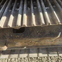 بیل مکانیکی|خودرو سنگین|ری, شهادت|دیوار