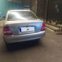 مزدا 323 تک برگ سند