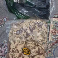 پوتین و لباس خدمت سربازی