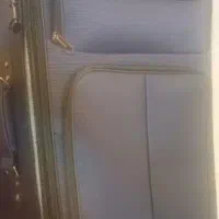 یک جفت چمدان سورمه ای و بنفش