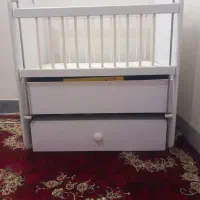 تخت گهواره ای نوزاد
