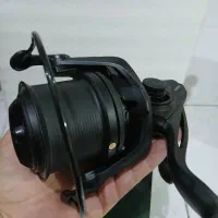 چرخ ۹۰۰۰ شیزکو طراحی و قطعه ژاپن دسته و اسپول فلز|ماهیگیری|کرج, حیدرآباد|دیوار