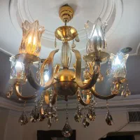 لوستر طلایی با لاله ها و اویزهای شامپاینی