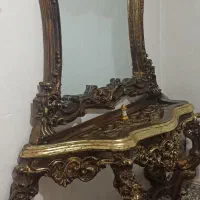 اینه کنسول و ساعت ایستاده