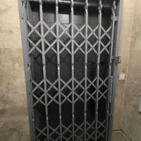 حفاظ کشویی درب اکاردونی ضد سرقت ریلی اکاردیونی