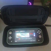 نینتندو سوییچ لایت خاکستری همراه با قاب و کیف|کنسول، بازی ویدئویی و آنلاین|تهران, سازمان برنامه شمالی|دیوار