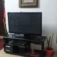 میز تلویزیون شیشه ای