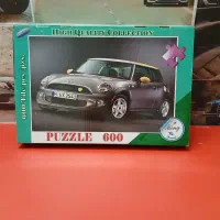 چند عدد پازل پلاستیکی و مقوایی