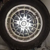 رینگ و لاستیک در حد نو با لاستیک بارز 90درصد