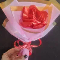 گل مصنوعی روبانی کادوپیچی شده