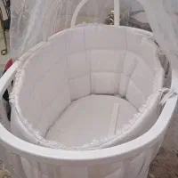 گهواره وصندلی کودک وتاپ