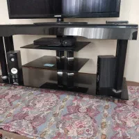 زیر تلویزیون شیشه ای