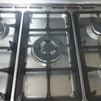 گازاستیل5شعله تمیز فر و جوجه گردان سالم.هودکارکرده