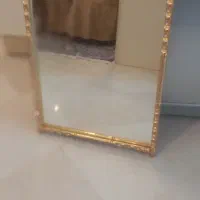آیینه با قاب برنجی