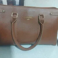 کیف زنانه قیمت ۵۵۰ و کتونی ۴۵۰