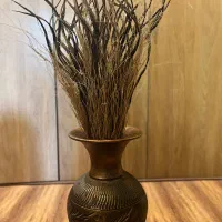 گلدان با گلهای بامبو