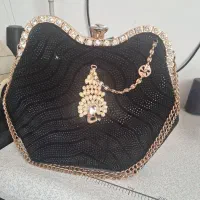 کیف مجلسی|کیف، کفش، کمربند|مشهد, خواجه ربیع|دیوار