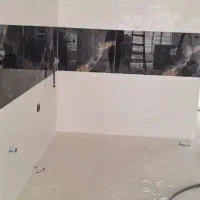 انجام کاشی و سرامیک ،سنگ مزار ،سنگ پله..