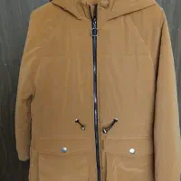 کاپشن سیلیکونی نونو آک|لباس|مهاجران, |دیوار