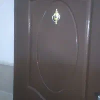 در چوبی ورودی خانه