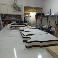 کارگر ساده و بسته بند پوشاک