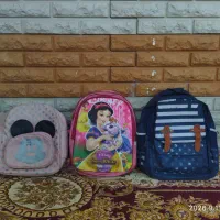 تعدادی ساک ورزشی و کوله پشتی