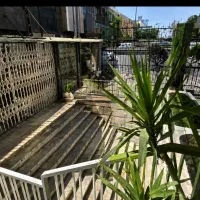 فروش یکجای ملک تجاری و آپارتمان اداری در ولیعصر