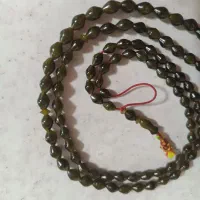 دو عدد تسبیح شاه مقصود زیتونی و پسته ای