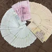 پول نقد نو یک پانصد دویست صد