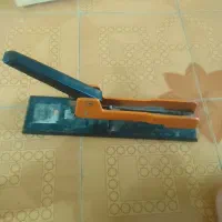 دستگاه منگنه