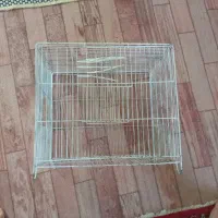 یک عدد قفس به همراه دوعدد لانه و یه تاب
