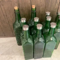 بطری شیشه ای بسیار باکیفیت سبز درب دلر