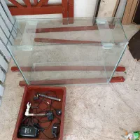 اکواریوم با تمامی پمپ ها و تظیم دمای آب