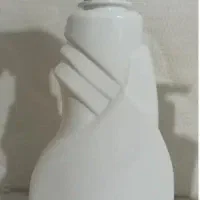 بطری شیشه شوی و مایع عمده