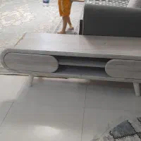 یک عدد میز تلویزیون مدل عینکی چوبی