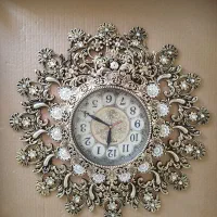 ساعت سیاه قلم وطللایی