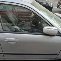 خودرو سواری مزدا ۳۲۳fl دنده ای نقره ای