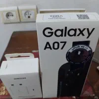 گوشی سامسونگ A07یکسال گارانتی همراه شارژرنوقاب گلس