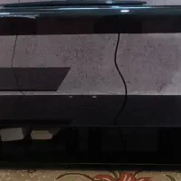 ۱ عدد میز تلوزیون شیشه ای توافقی