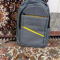 نونو|کیف، کفش، کمربند|قم, قلعه کامکار|دیوار