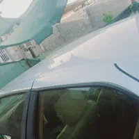 پژو بدون رنگ فقط یک گلگیر عقبی افتاب سوختگی داره